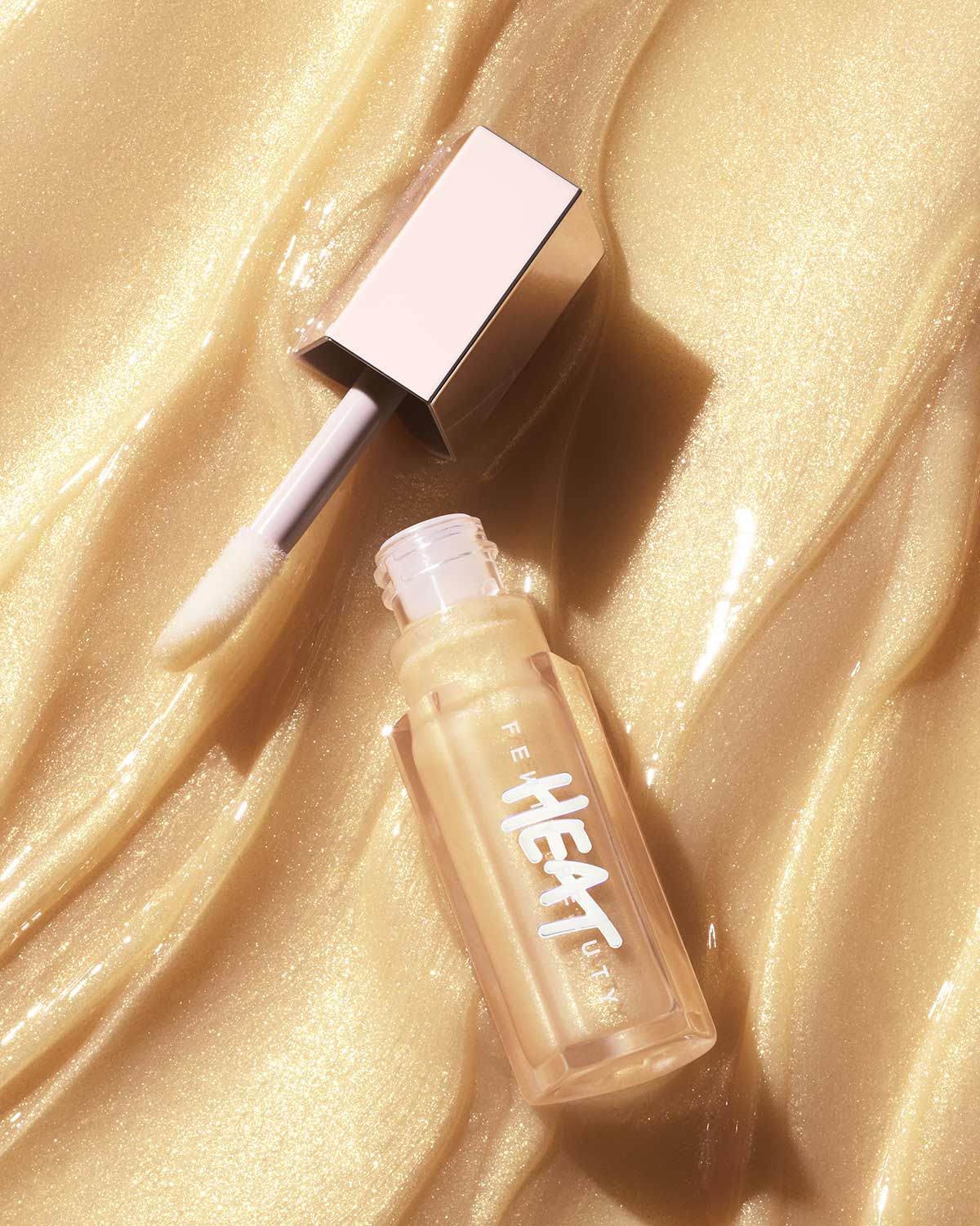 GLOSS BOMB HEAT UNIVERSAL LIP LUMINIZER + PLUMPER - ref : 05 LEMON LAVA